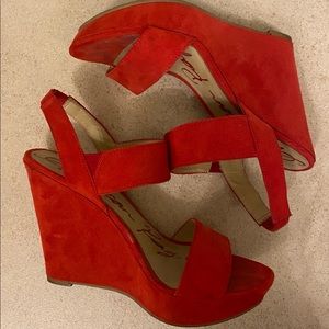 Red wedged heels